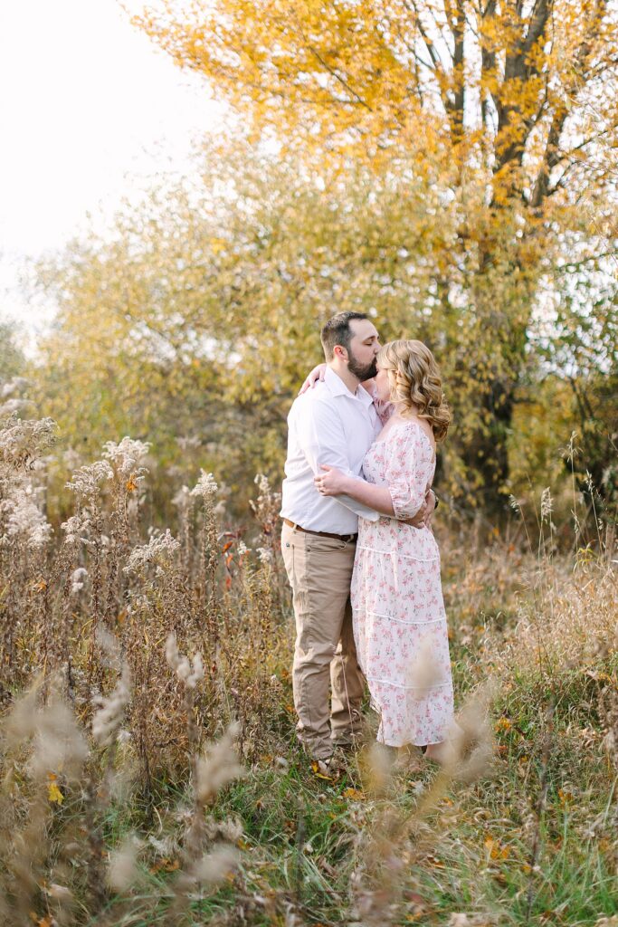 Sunset engagement session on the beach in fall