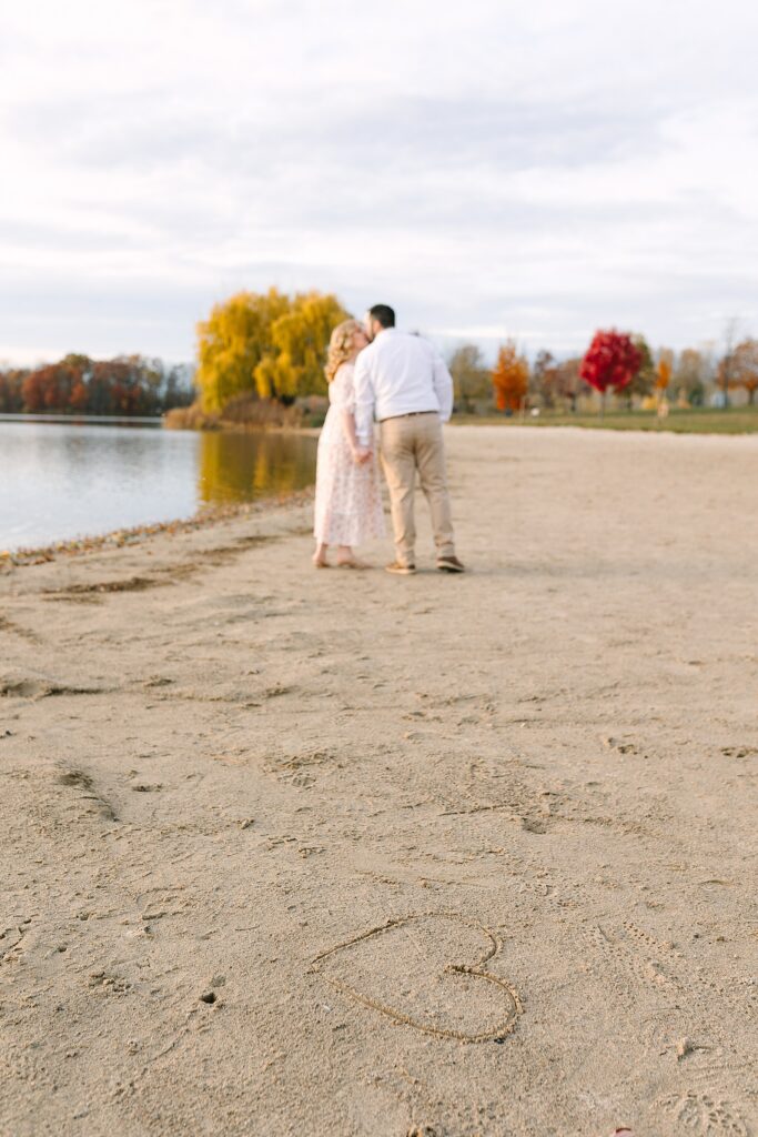 Sunset engagement session on the beach in fall