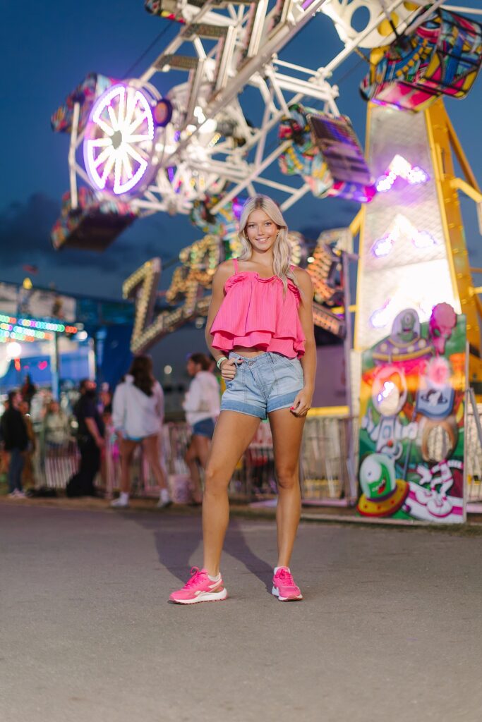 Charlie smiling during her senior pictures at the Ionia Free Fair in Ionia, Michigan.