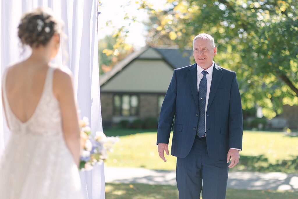 Aerin and Jack's wedding ceremony at Saint Thomas Aquinas and University Club of Michigan State in East Lansing