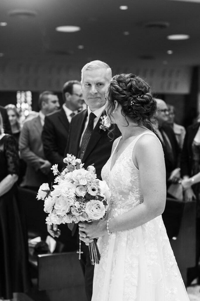 Aerin and Jack's wedding ceremony at Saint Thomas Aquinas in East Lansing