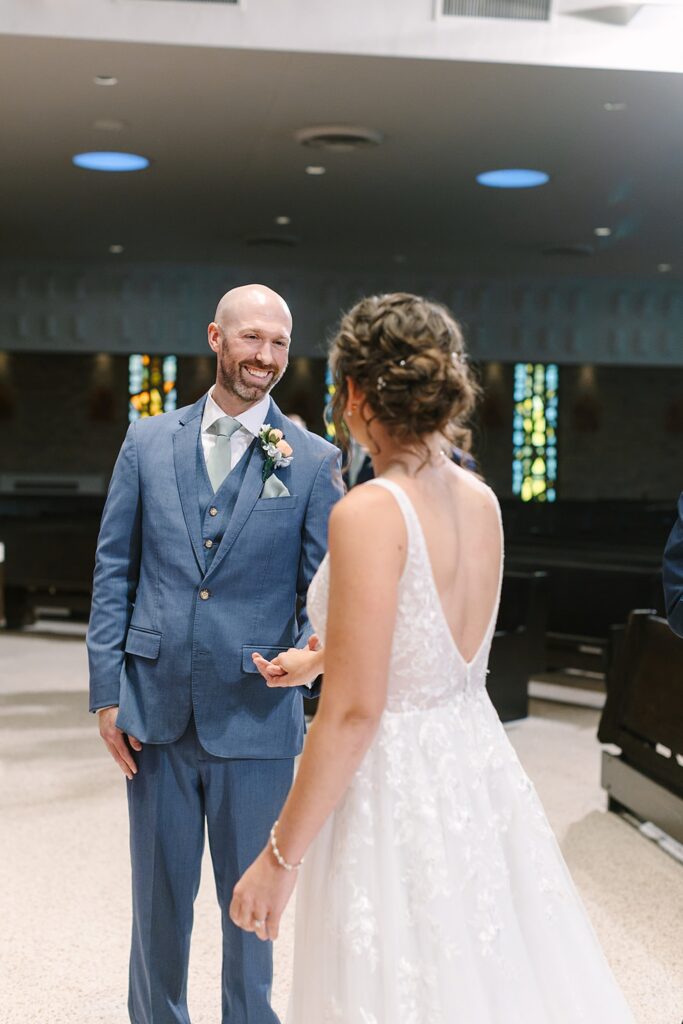 Aerin and Jack's wedding ceremony at Saint Thomas Aquinas in East Lansing