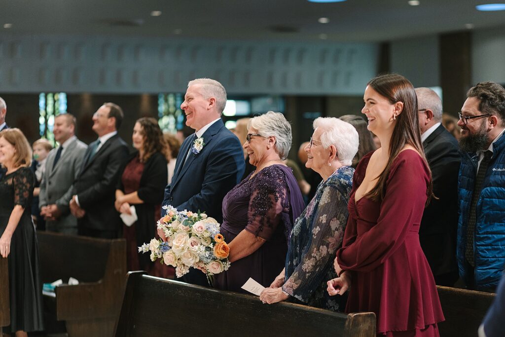 Aerin and Jack's wedding ceremony at Saint Thomas Aquinas in East Lansing