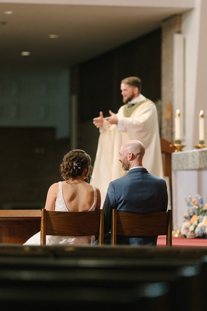 Aerin and Jack's wedding ceremony at Saint Thomas Aquinas in East Lansing