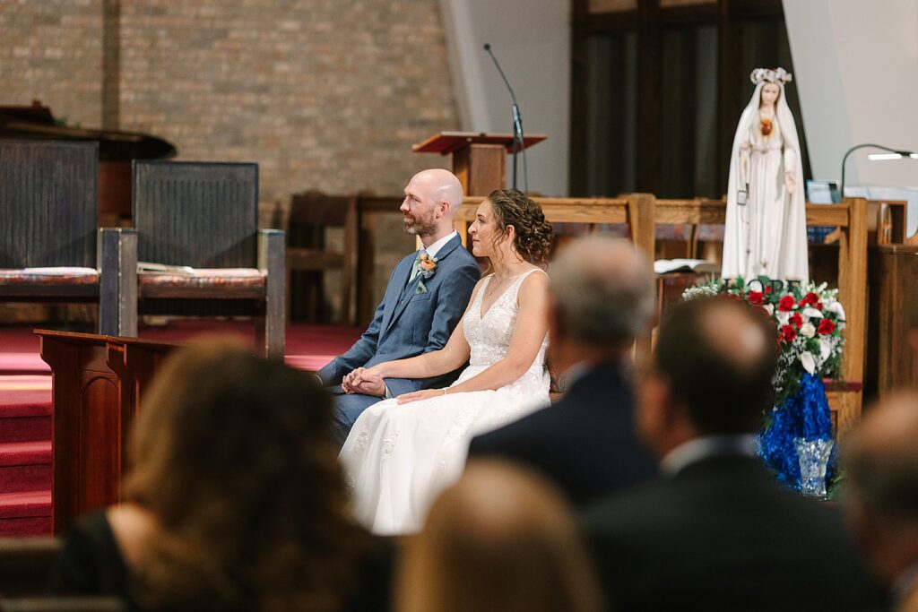 Aerin and Jack's wedding ceremony at Saint Thomas Aquinas in East Lansing
