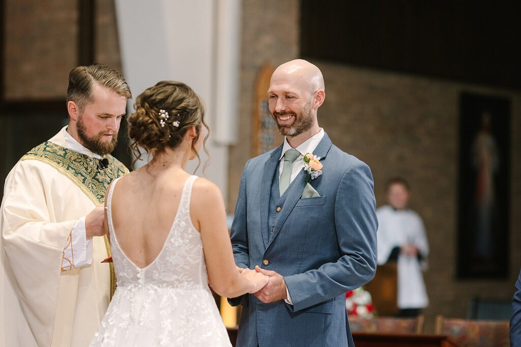 Aerin and Jack's wedding ceremony at Saint Thomas Aquinas in East Lansing