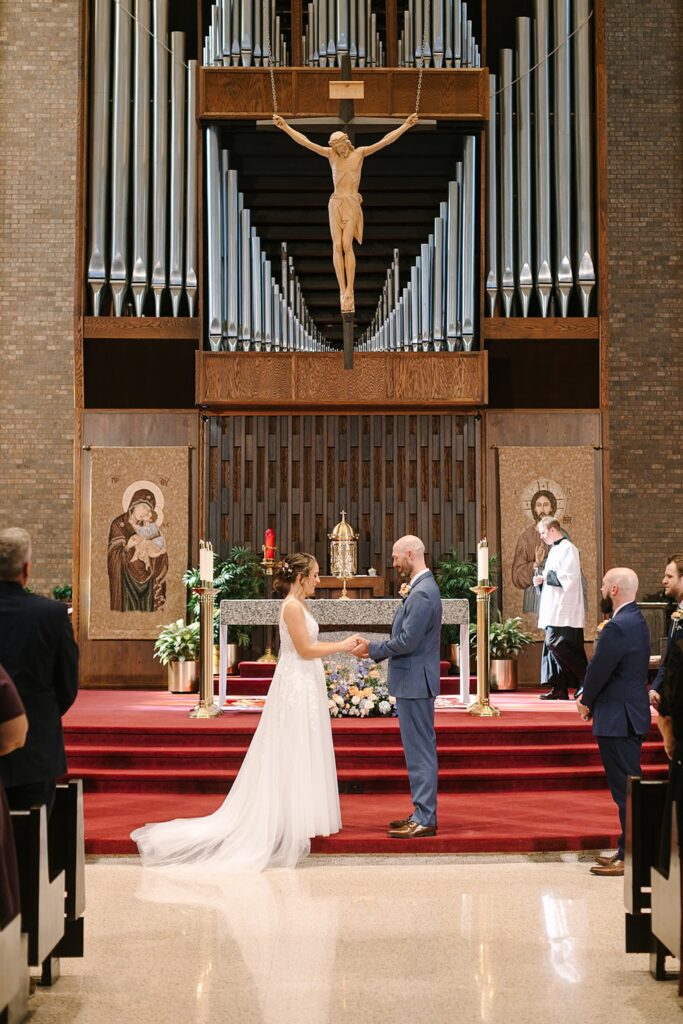 Aerin and Jack's wedding ceremony at Saint Thomas Aquinas in East Lansing