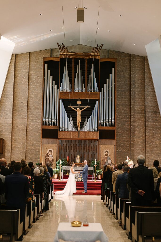 Aerin and Jack's wedding ceremony at Saint Thomas Aquinas in East Lansing