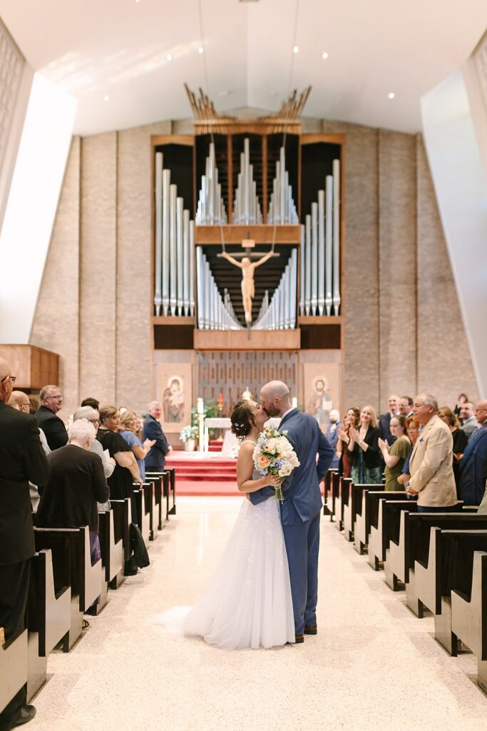 Aerin and Jack's wedding ceremony at Saint Thomas Aquinas in East Lansing