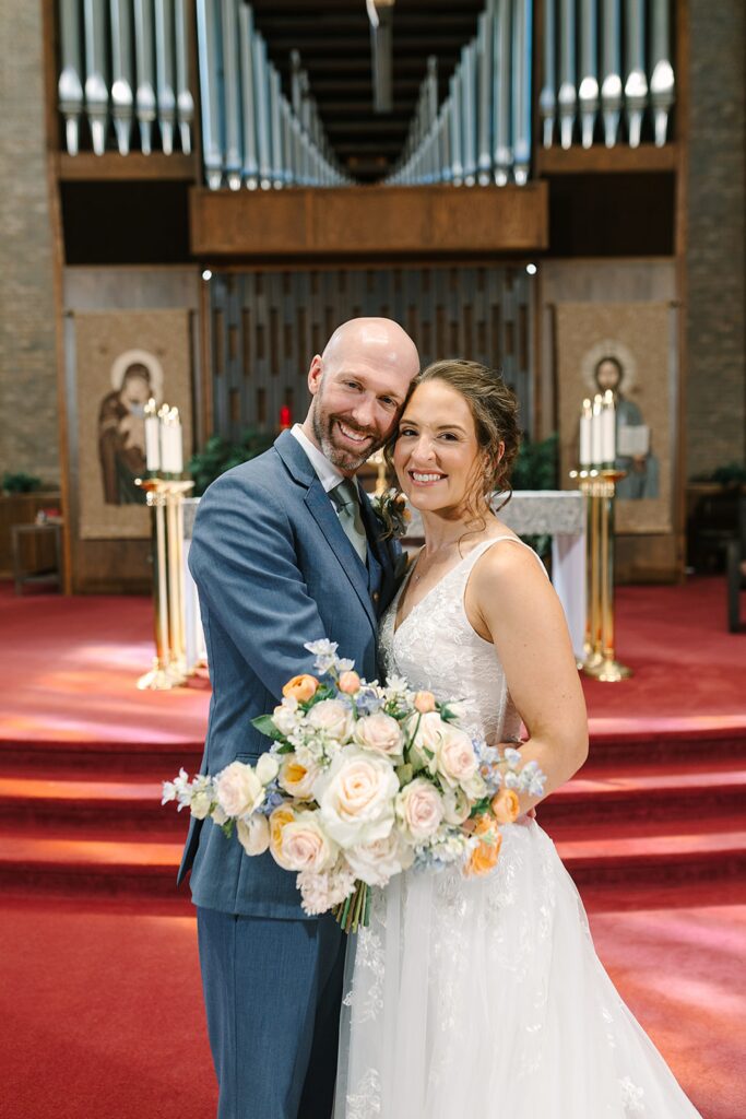 Aerin and Jack's wedding ceremony at Saint Thomas Aquinas in East Lansing