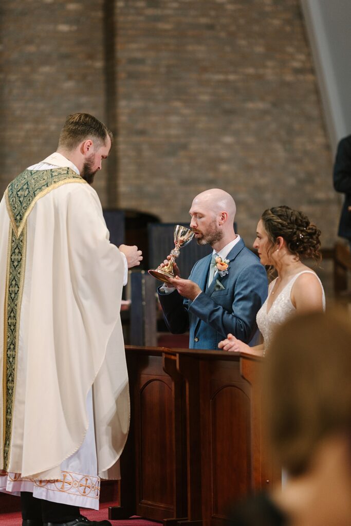 Aerin and Jack's wedding ceremony at Saint Thomas Aquinas in East Lansing