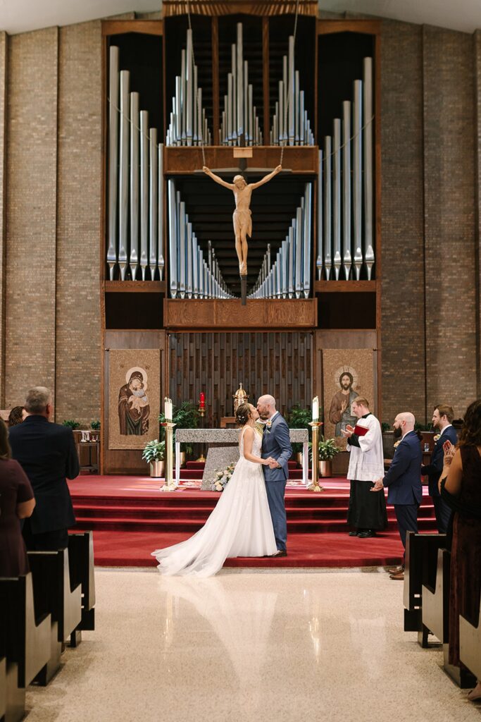 Aerin and Jack's wedding ceremony at Saint Thomas Aquinas in East Lansing