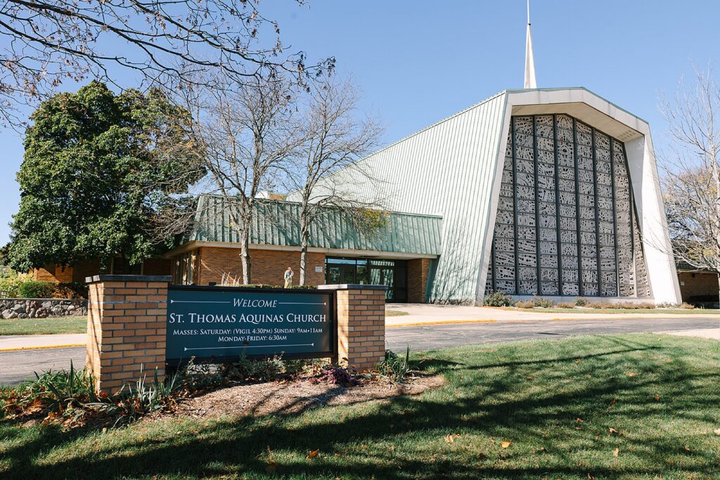 Aerin and Jack's wedding ceremony at Saint Thomas Aquinas in East Lansing