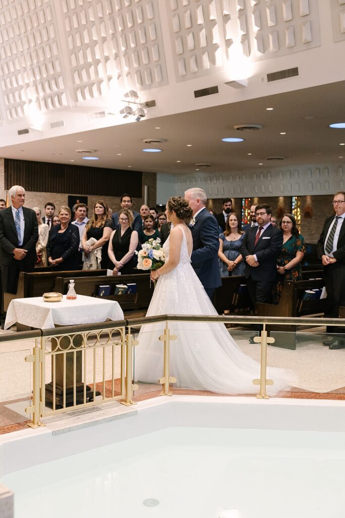 Aerin and Jack's wedding ceremony at Saint Thomas Aquinas in East Lansing