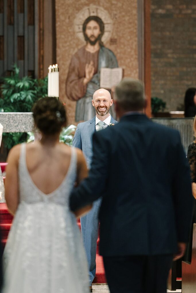 Aerin and Jack's wedding ceremony at Saint Thomas Aquinas in East Lansing