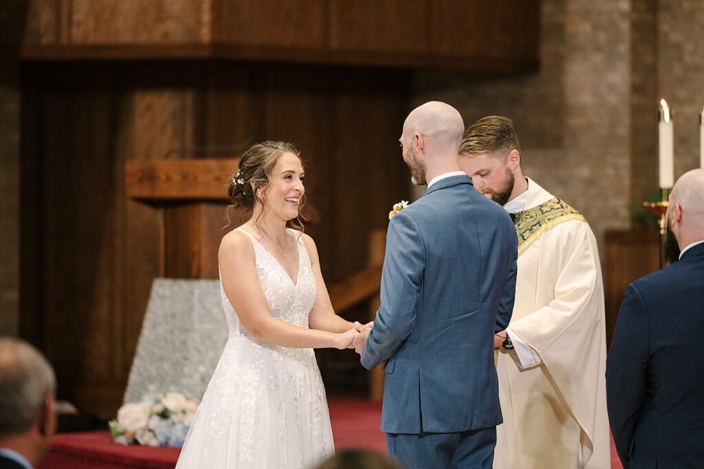 Aerin and Jack's wedding ceremony at Saint Thomas Aquinas in East Lansing